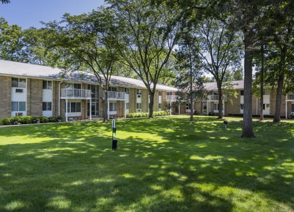 our apartments are located in a quiet area with grass and trees