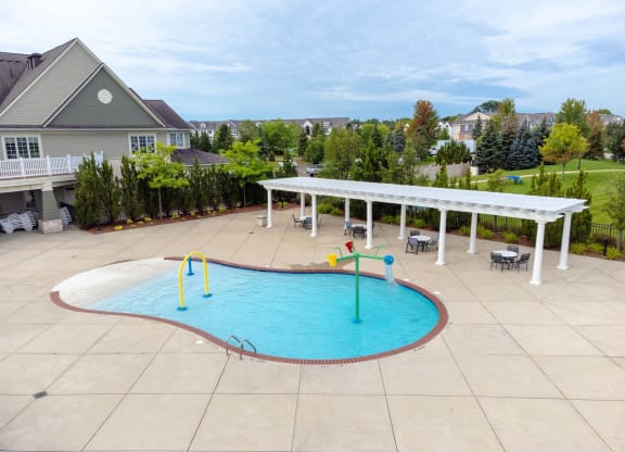 our apartments showcase a swimming poolat The Harbours Apartments, Clinton Twp, 48038