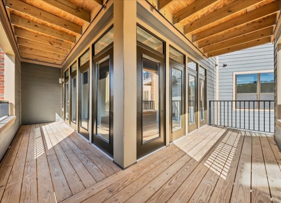 the home has a large deck overlooking the water at Luxe 360 on Centerpointe Apartments, Midlothian