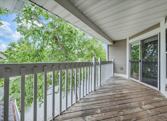 the deck has a view of the trees and the water at Trophy Club at Bellgrade, Midlothian, VA, 23113
