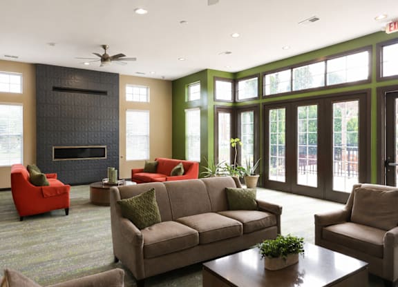 A living room with a fireplace and a couch.