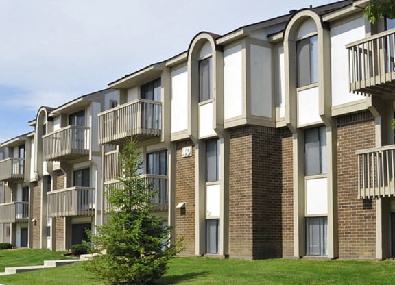 Apartment Building Exterior at The Village Apartments, Michigan, 48393