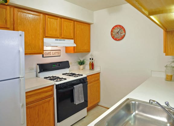 Well Equipped Kitchen at The Harbours Apartments, Clinton Twp, MI