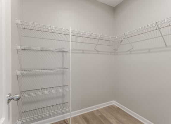 the spacious walk in closets in every apartment at the flats at west end apartments at Alexandria of Carmel Apartments, Indiana