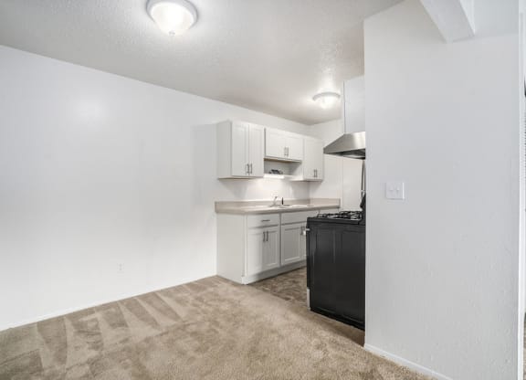 dining area leading into a kitchen at Apple Ridge Apartments, Michigan, 49534
