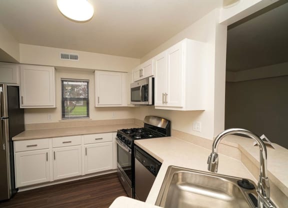 a renovated end style kitchen with a window  at Arbor Lakes Apartments, Indiana, 46516