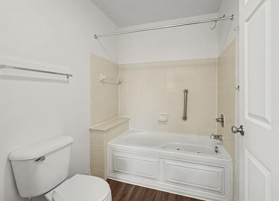 A white bathroom with a soaking tub at Autumn Lakes Apartments and Townhomes, Mishawaka, 46544
