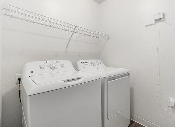 A laundry room with a washer and dryer at Autumn Lakes Apartments and Townhomes, Mishawaka, 46544