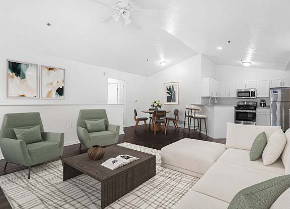 A living room and a kitchen with stainless steel appliances at Autumn Lakes Apartments and Townhomes, Mishawaka, 46544