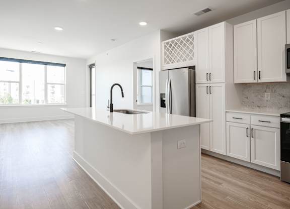 a large white kitchen with white cabinets and a white counter top at Avant & Avant II, Carmel, IN, 46032