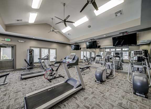 our fitness center is equipped with state of the art equipment including cardio machines and weights at Avellan Springs Apartments, Morrisville, NC, 27560