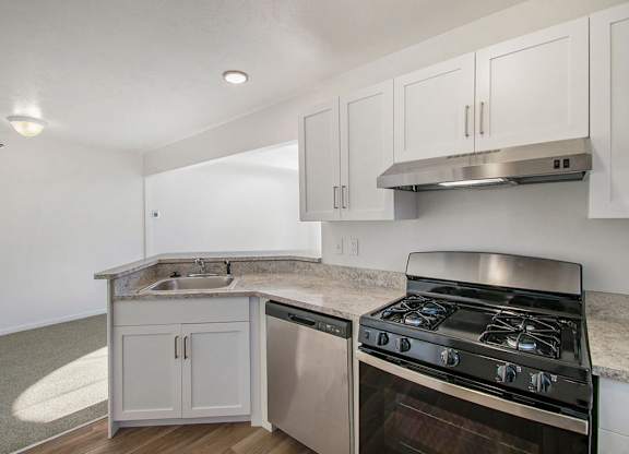 A kitchen with stainless-steel appliances at Black Sand Apartment Homes in Lincoln, NE