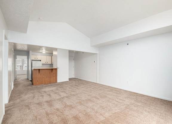 a living room with cathedral ceiling at Black Sand Apartment Homes in Lincoln, NE
