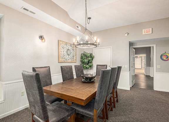 a clubhouse dining area with table and chairs at Black Sand Apartment Homes, Nebraska