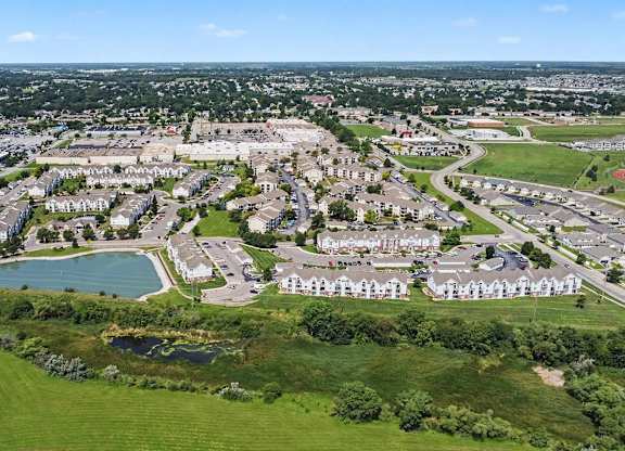 Aerial view of apartment complex with retention ponds at Black Sand Apartments Homes, Lincoln