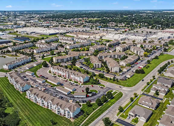 Aerial view of multifamily community with curved streets at Black Sand Apartments Homes, Nebraska