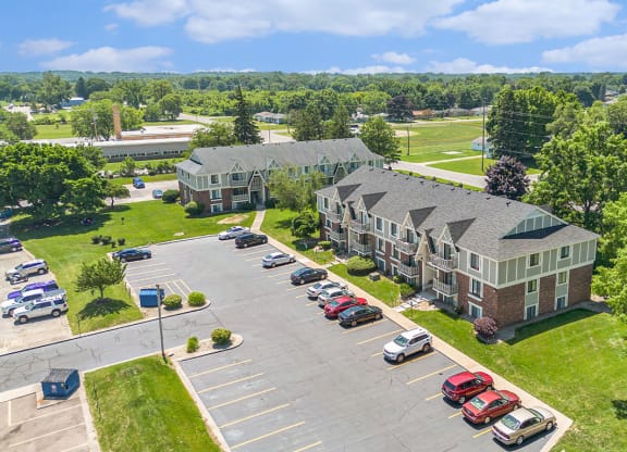 an aerial view with shade trees and green lawns at Briarwood Apartments, Benton Harbor, Michigan