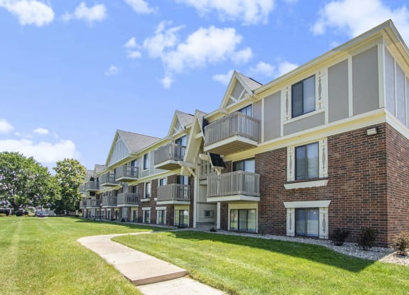 Attractive apartment building with green courtyard at Briarwood Apartments, Benton Harbor, Michigan