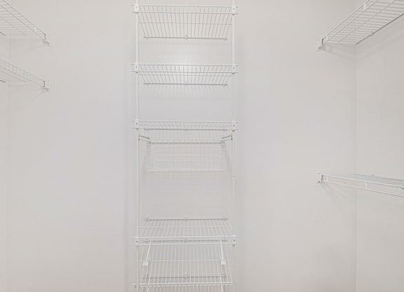 walk in closet with white shelves  at Black Sand Apartment Homes, Nebraska, 68504