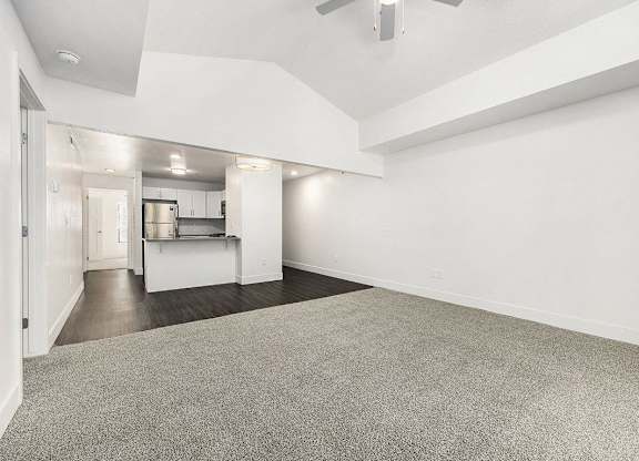 two bedroom living room with cathedral ceiling  at Byron Lakes Apartments, Michigan