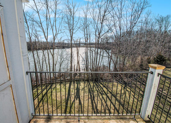 Balcony view overlooking a pond at Canal 2 Apartments, Lansing, Michigan