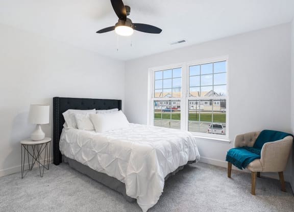 Bedroom with Lots of Natural Light at Meadowbrooke Apartment Homes in Kentwood, MI 49512