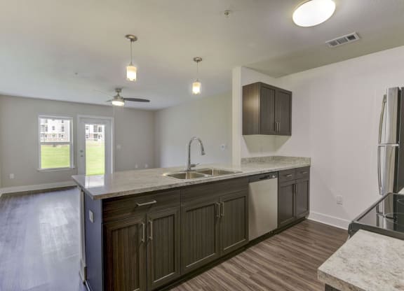 Kitchen with Breakfast Bar at Chase Creek Apartment Homes, Huntsville, AL, 35811