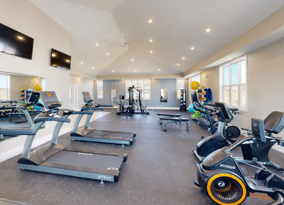 Cardio machines in the fitness center at Chase Creek Apartment Homes, Alabama, 35811