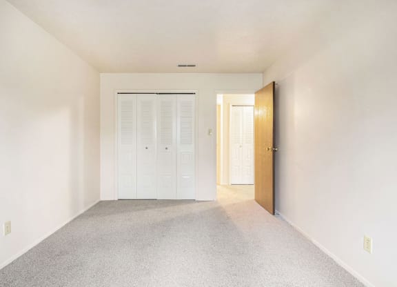 Bedroom with Large Closet at Concord Place Apartments in Kalamazoo, Michigan 49009