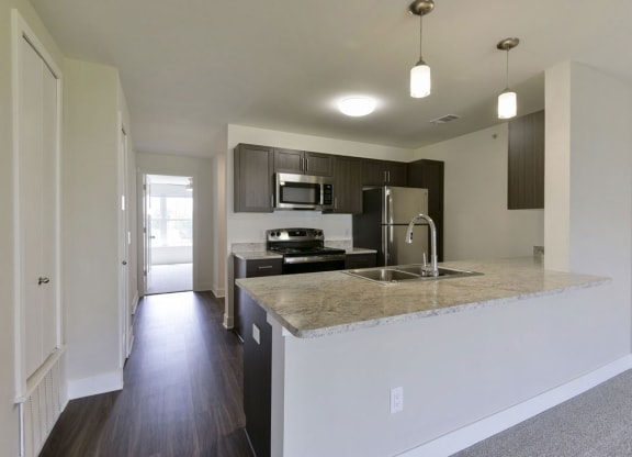 kitchen with stainless steel appliances at Copper Creek Apartment Homes, Maize, KS, 67101