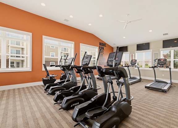 Fitness center with cardio equipment at Copper Creek Homes Apartments, Maize, 67101