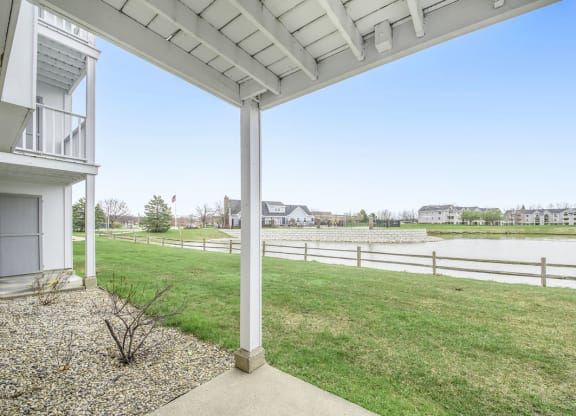 Patio with Enclosed Storage at The Crossings Apartments, Grand Rapids, Michigan