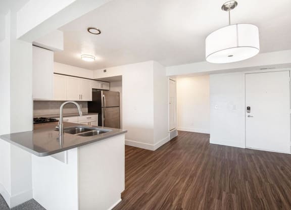 Kitchen Breakfast Bar and Dining Area at The Crossings Apartments, Grand Rapids, Michigan