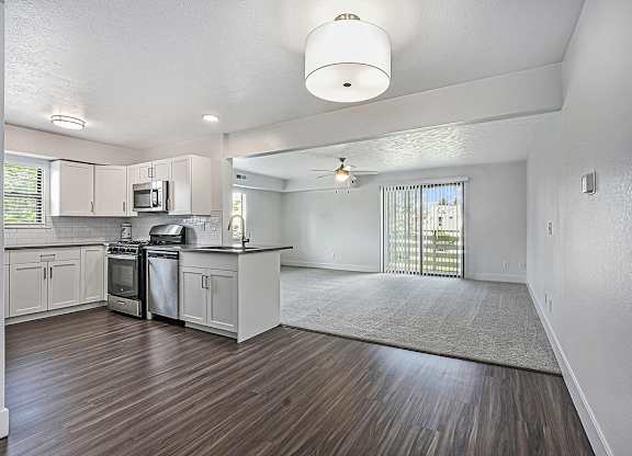 end style kitchen and living room at The Crossings Apartments, Michigan, 49508