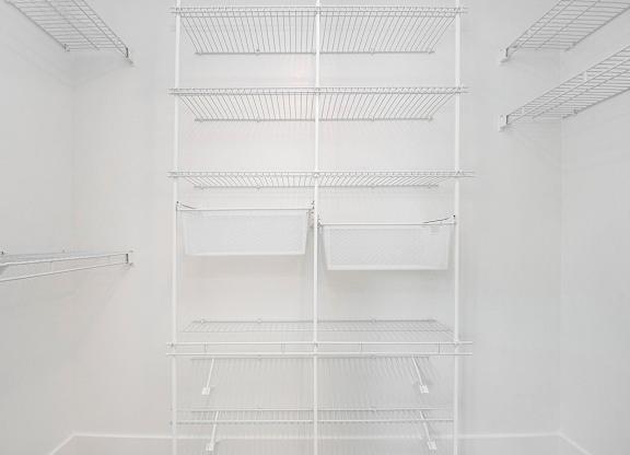 Large Walk In Closet with Wardrobe Organizers at The Crossings Apartments, Grand Rapids, Michigan