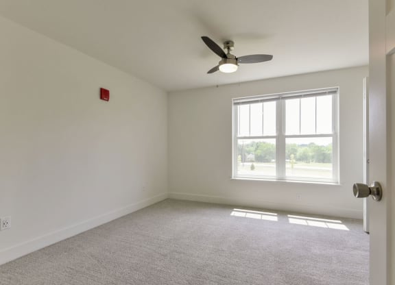 Spacious Bedroom with Large Windows at Dodson Pointe Apartment Homes, Rogers, AR, 72758