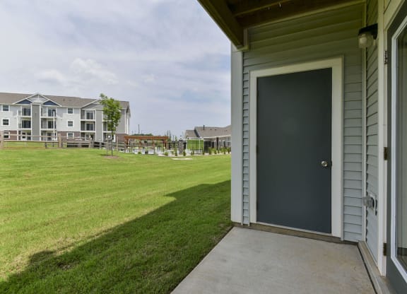 Lush, Green Pond Views from Private Patio at Dodson Pointe Apartment Homes, Rogers, AR, 72758
