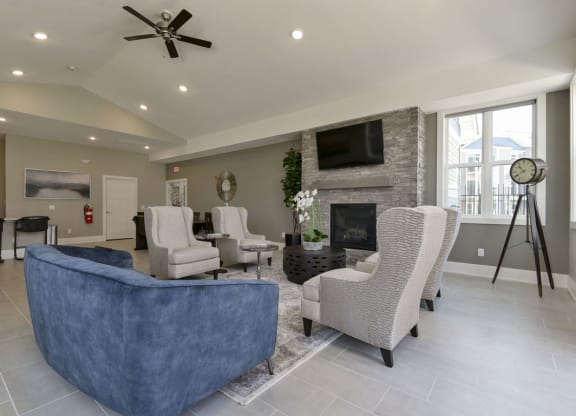 Community building with fireplace wall at Dodson Pointe Apartment Homes in Rogers, AR