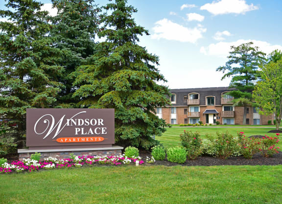 the sign in front of the windsor place apartments at Windsor Place Apartments, Davison, 48423