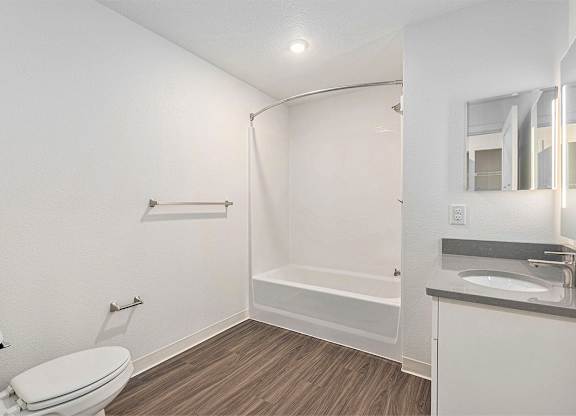 Primary bathroom with hard surface flooring at Eagle Ridge Apartment Homes,  Michigan