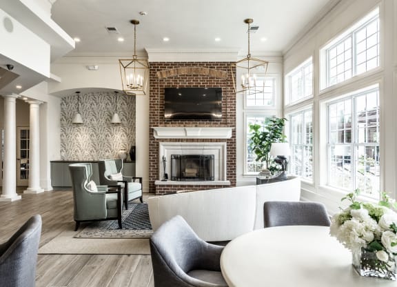 TV seating and coffee bar in the clubhouse at Alexandria of Carmel Apartments, Carmel, IN, 46032