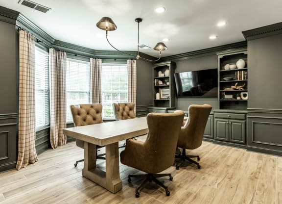 Clubhouse business center with conference table at Alexandria of Carmel Apartments, Indiana