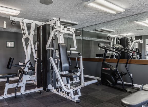 a gym with various exercise equipment at Bavarian Village Apartments, Indianapolis, Indiana