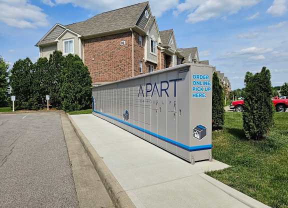 A grey and blue sign that says
