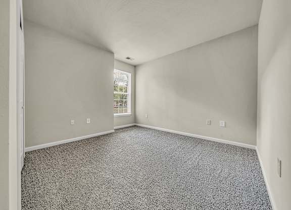 Empty Living Room with window view at Enclave Apartments, Virginia