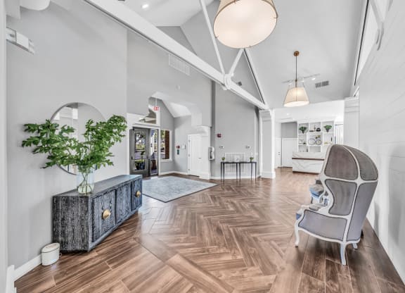the living room is open to the dining room and kitchen at Trophy Club at Bellgrade, Midlothian, VA, 23113