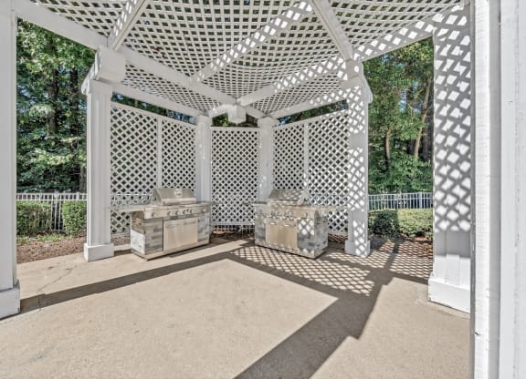 two bbq areas under a white gazebo with two grills at Trophy Club at Bellgrade, Midlothian, VA, 23113