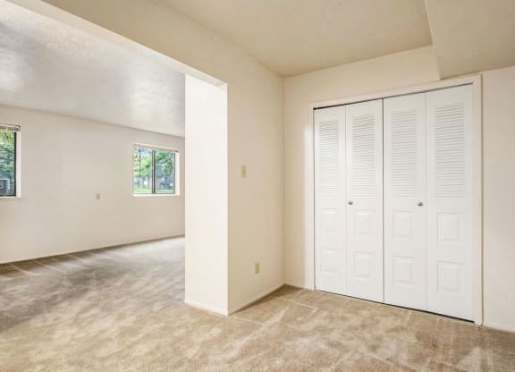 Studio sleeping area with closet at Old Farm Apartments, Elkhart, Indiana