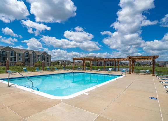 Swimming Pool with Lounge Seating at Fieldstream Apartment Homes, Ankeny, Iowa