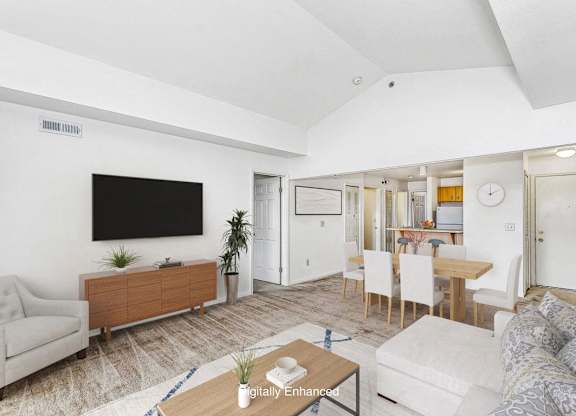 a dining room with a high ceiling at Fieldstream Apartment Homes, Iowa